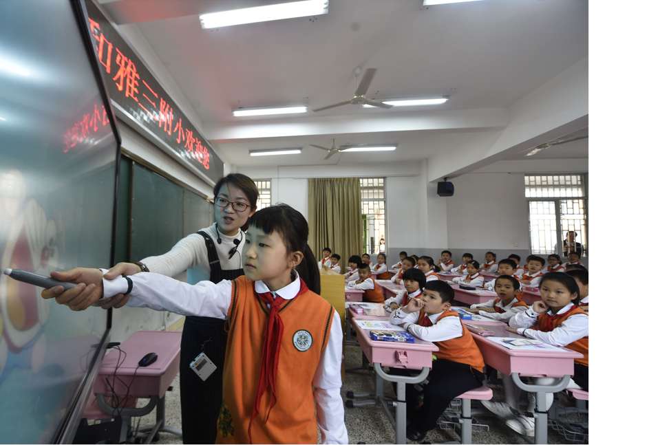 No masks in this class at No. 3 Elementary School, affiliated to Fuzhou Institute of Education, in Fuzhou, Fujian Province. Photo: Xinhua