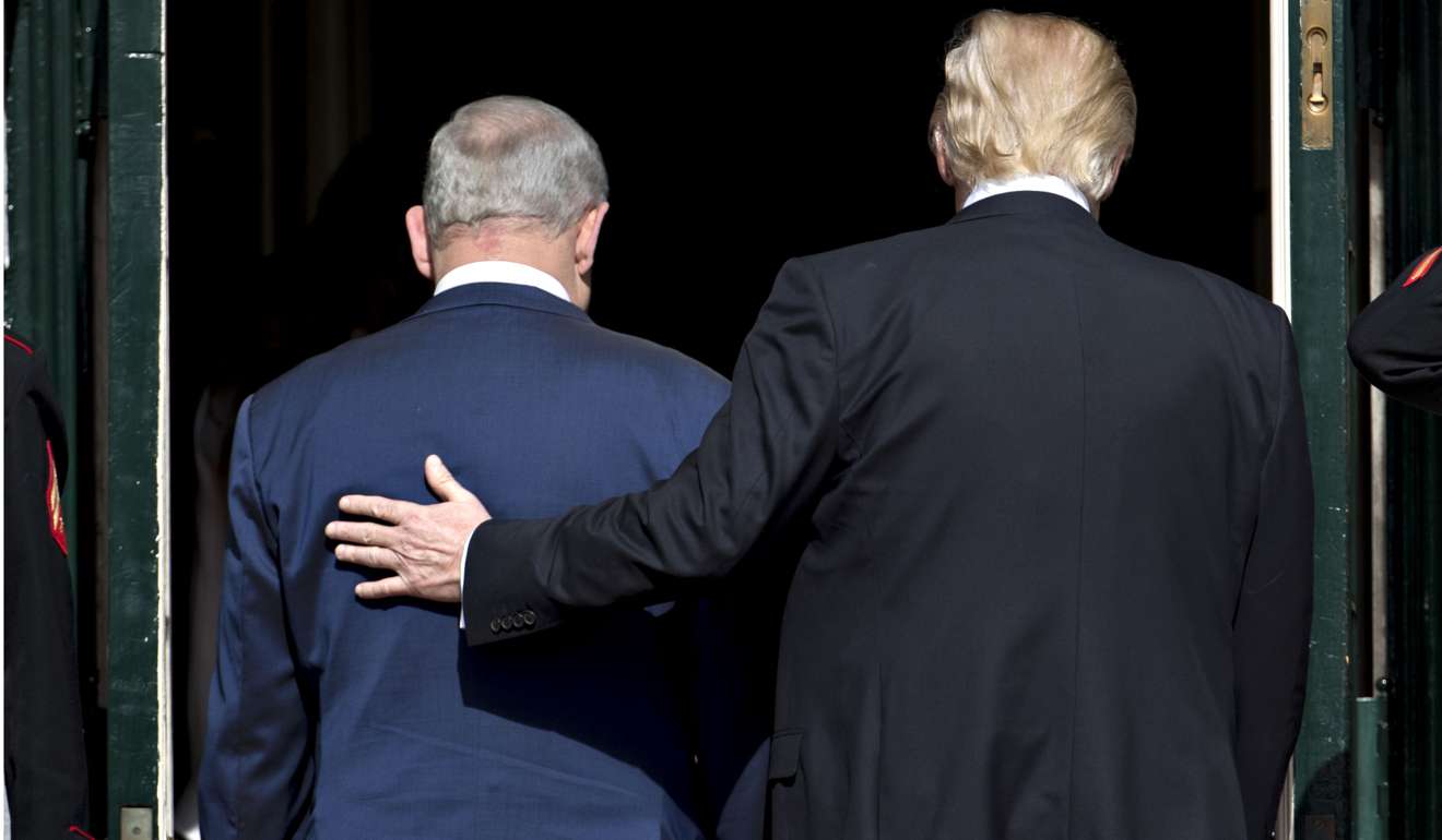 US President Donald Trump (right) and visiting Israeli Prime Minister Benjamin Netanyahu walk into the White House in Washington, D.C., at a meeting this month. For decades, under both Democrat and Republican presidents, the two-state solution has been the default endgame option. Has this changed under Trump? Photo: Bloomberg