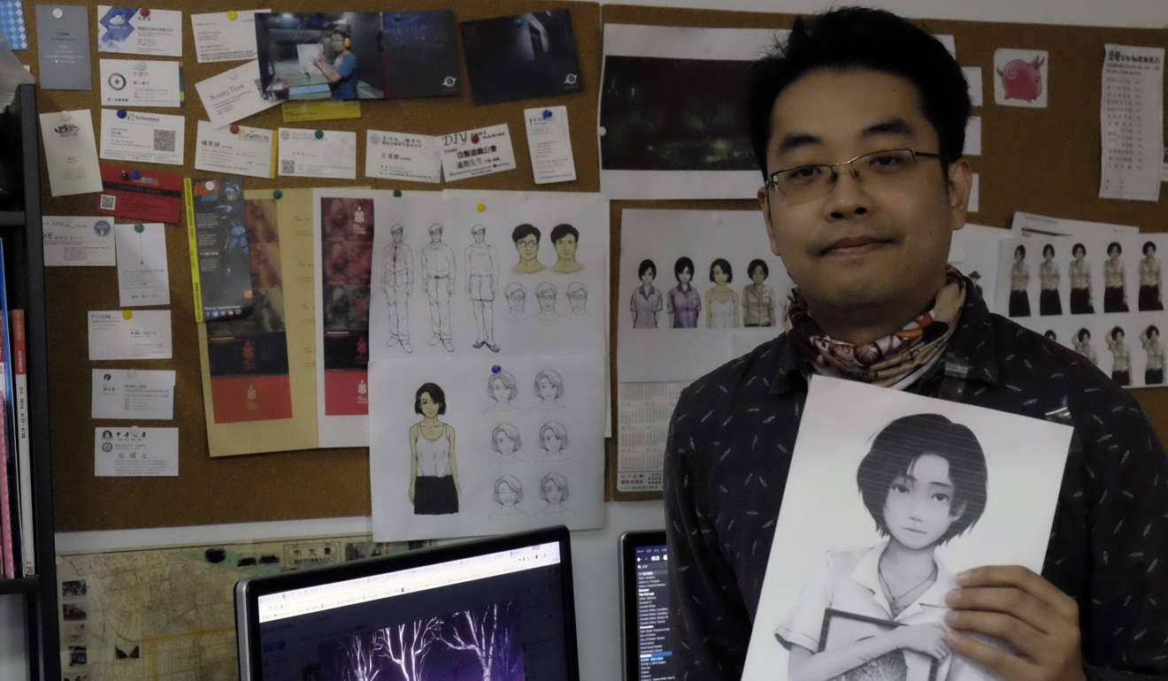 Game developer Yao Shuen-ting displays a key figure in his horror video game “Detention”. Photo: AFP