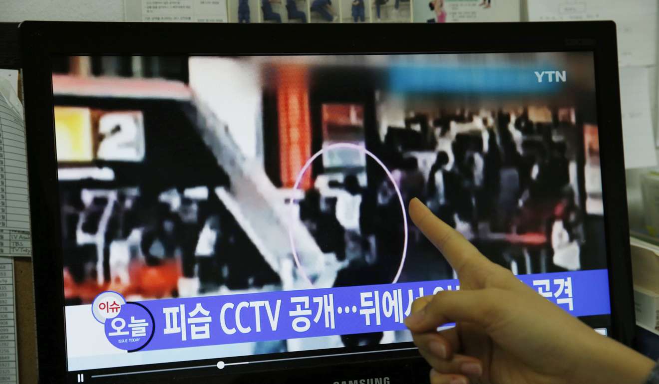 A TV news report showing the assassination of North Korean leader Kim Jong-un's half-brother Kim Jong-nam at the airport of Kuala Lumpur. Photo: EPA