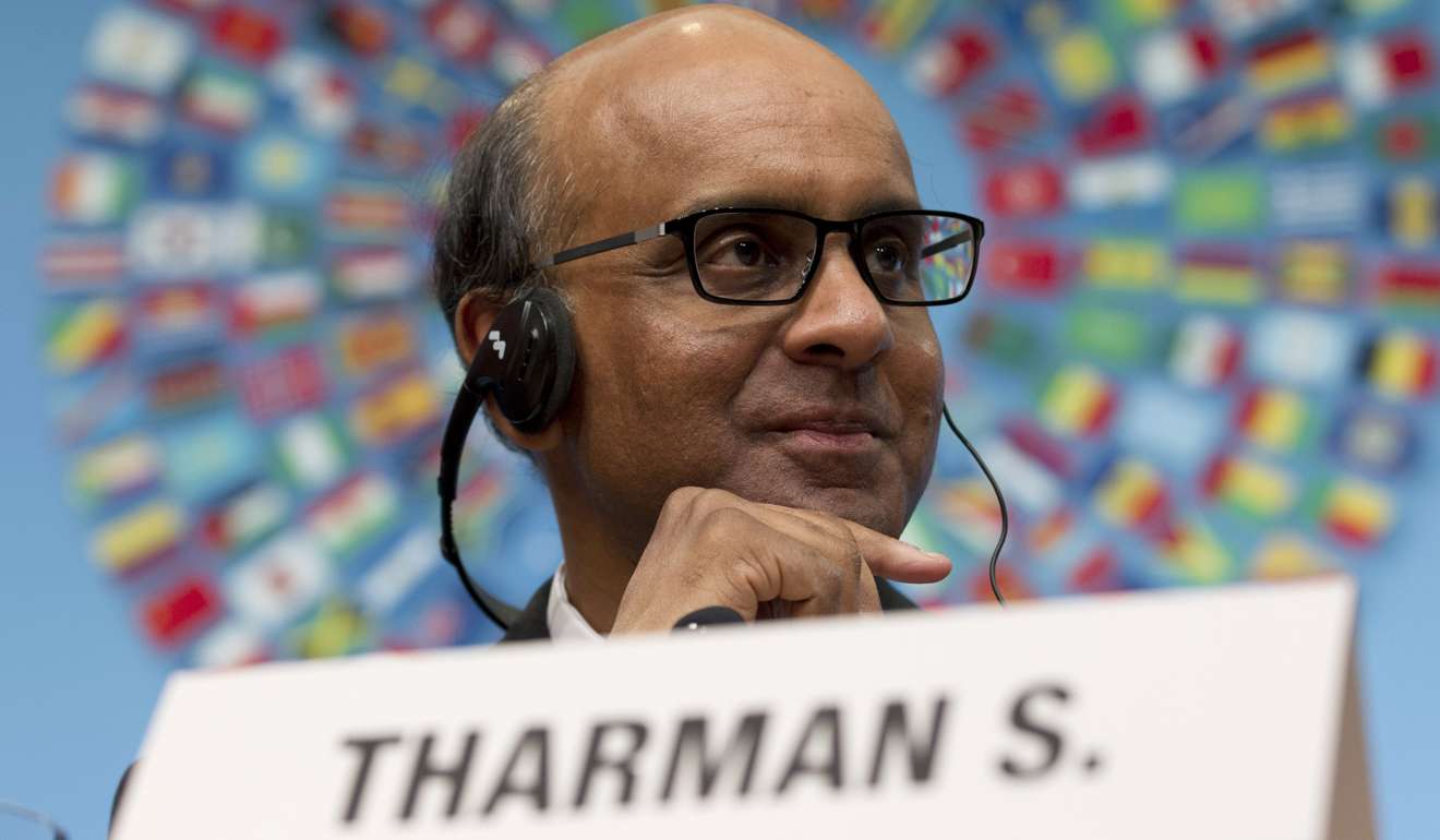 Tharman Shanmugaratnam listens to a question during a news conference. Photo: AP
