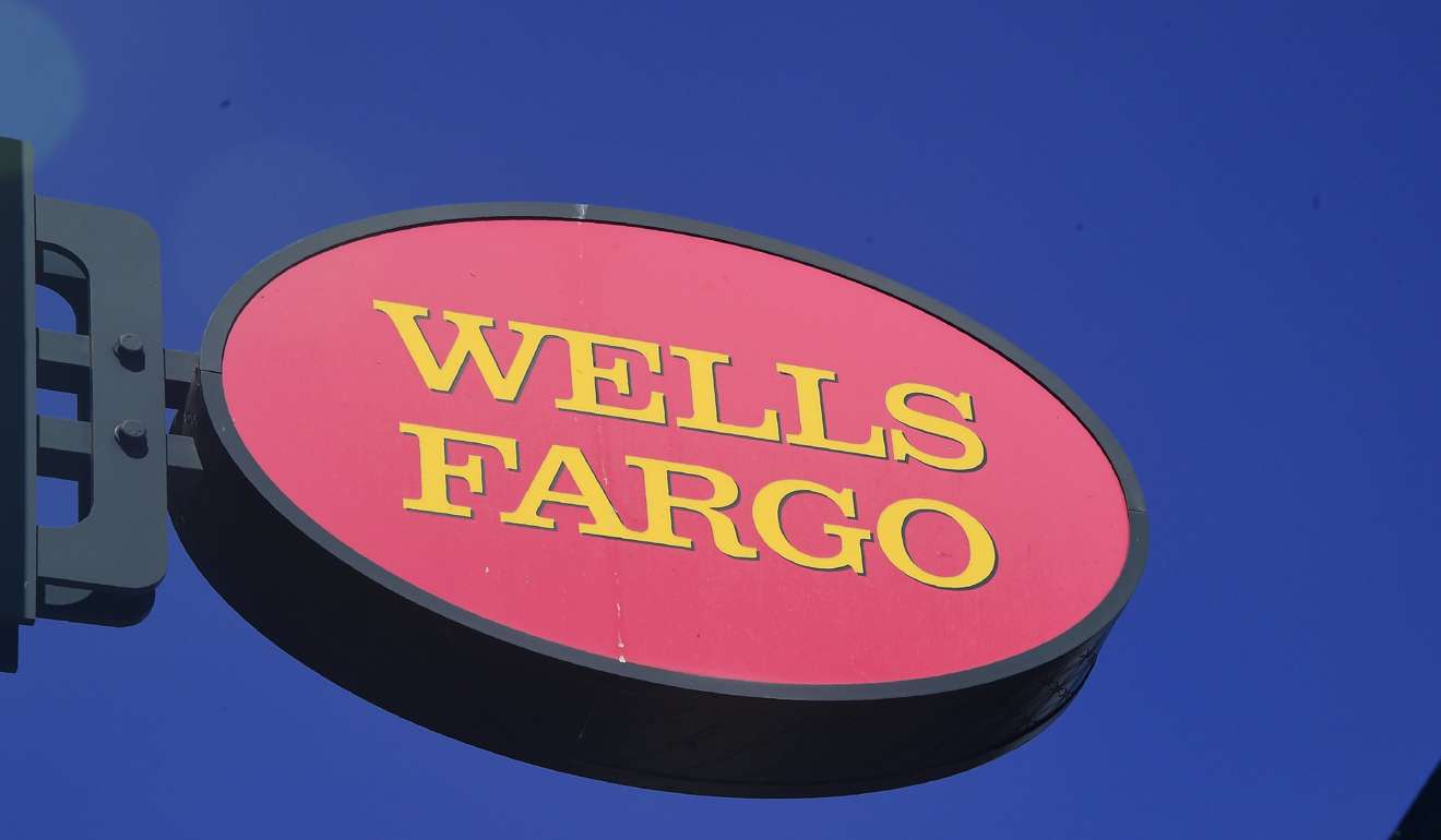 A Wells Fargo sign is seen in front of a branch in Pasadena, California, as US banks turned in a sterling fourth quarter to see profits jump during the period. Photo: AFP