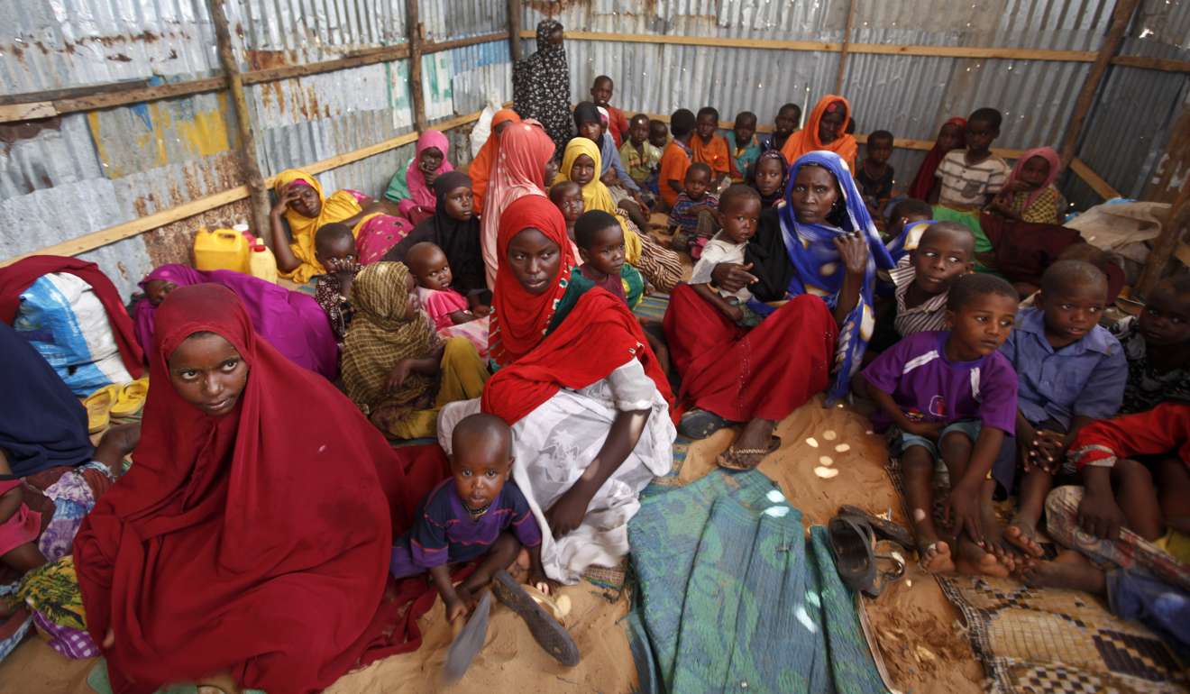 Displaced Somalis who fled the drought sit in a camp in the capital Mogadishu, Somalia. Photo: AP