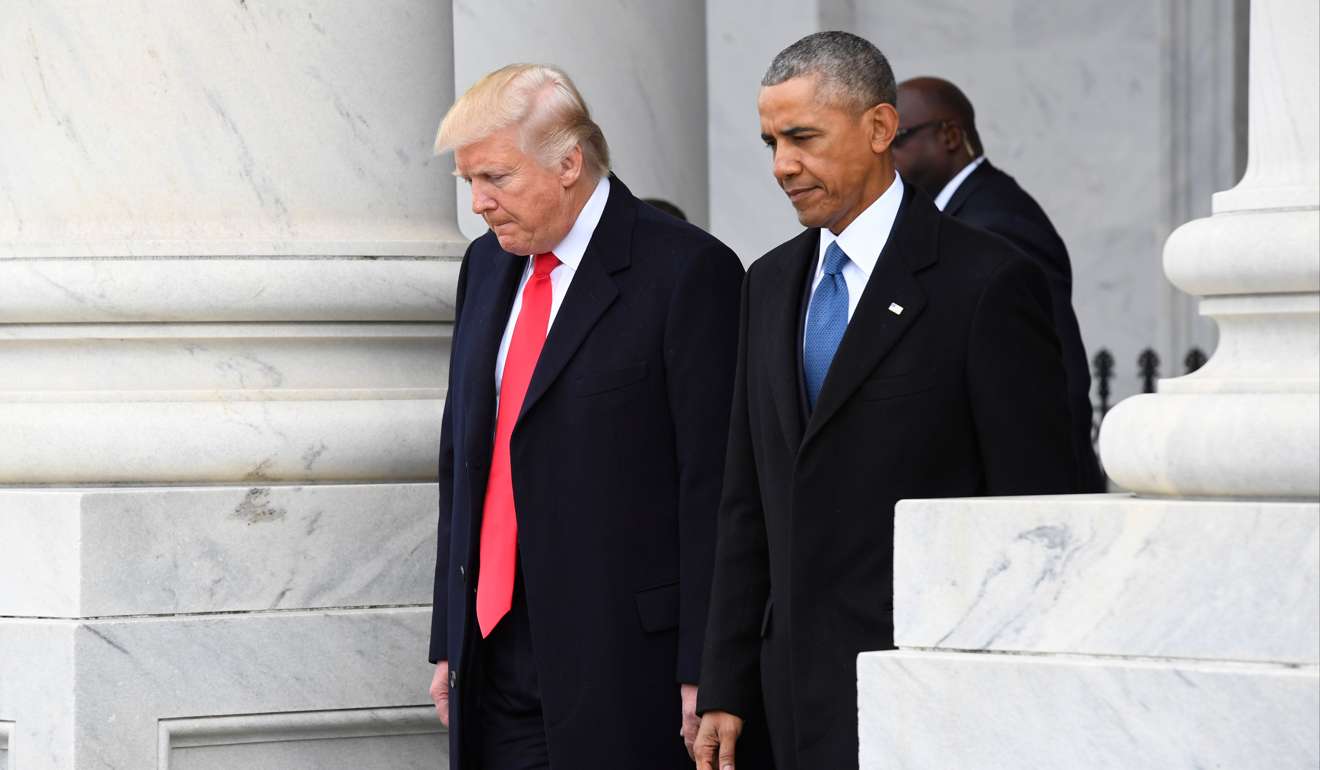 US President Donald Trump and former President Barack Obama walk out of the East front prior to Obama's departure from the 2017 presidential inauguration. Photo: Reuters