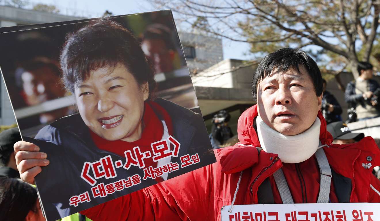 Supporter of impeached South Korean President Park Geun-hye. Photo: EPA