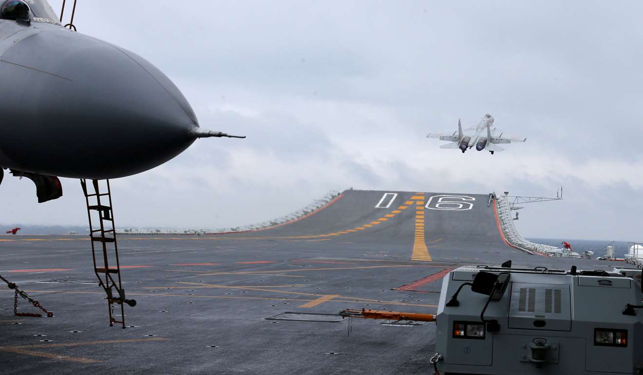 J-15 fighters from China’s Liaoning aircraft carrier conduct a drill in January in an area of the South China Sea. The unpredictability of US President Donald Trump compels China to prepare for the worst by building up its defences – particularly its navy and military cyber capabilities. Photo: Reuters