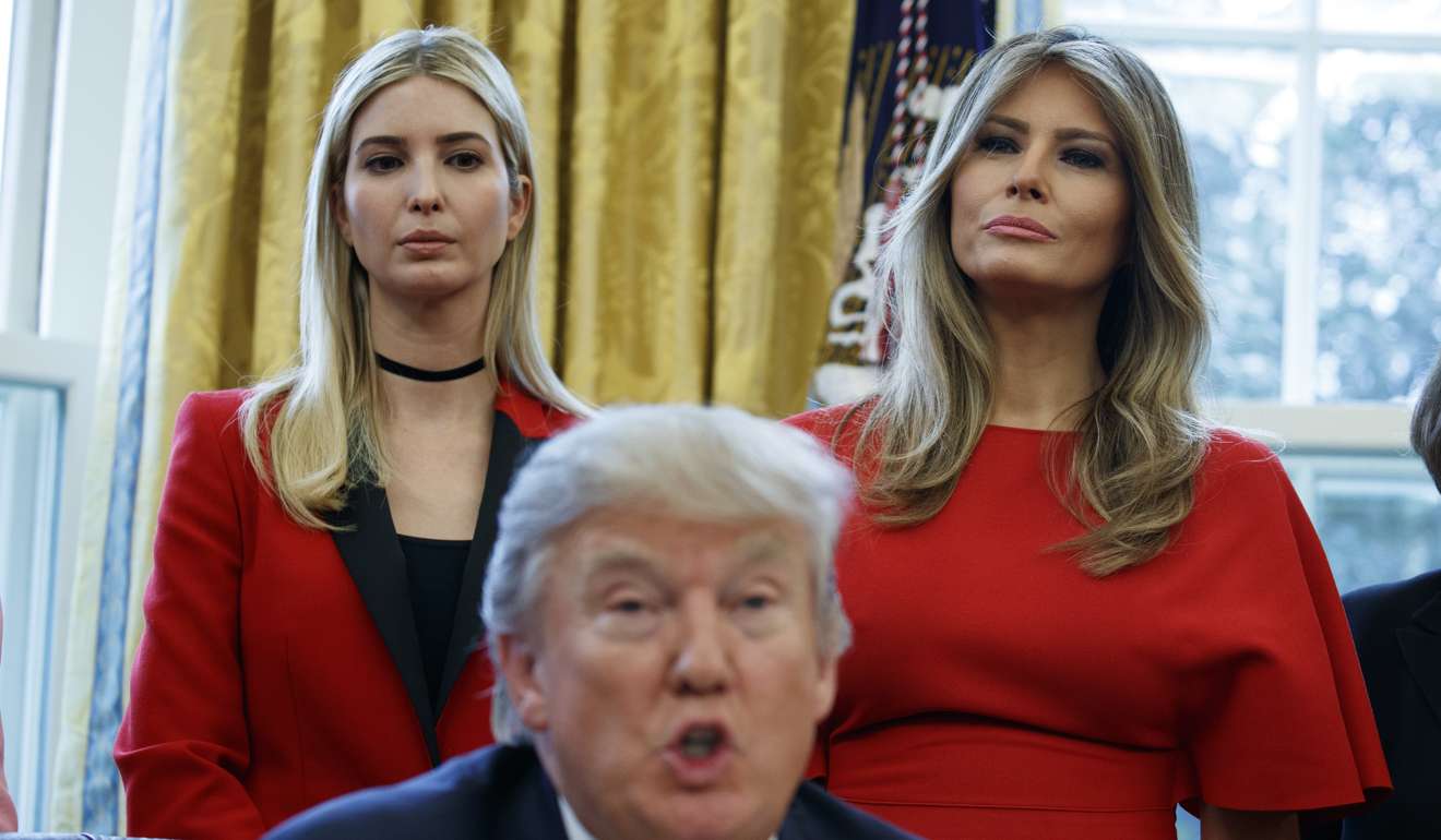 Ivanka Trump, left, and first lady Melania Trump listen as President Donald Trump speaks. Photo: AP