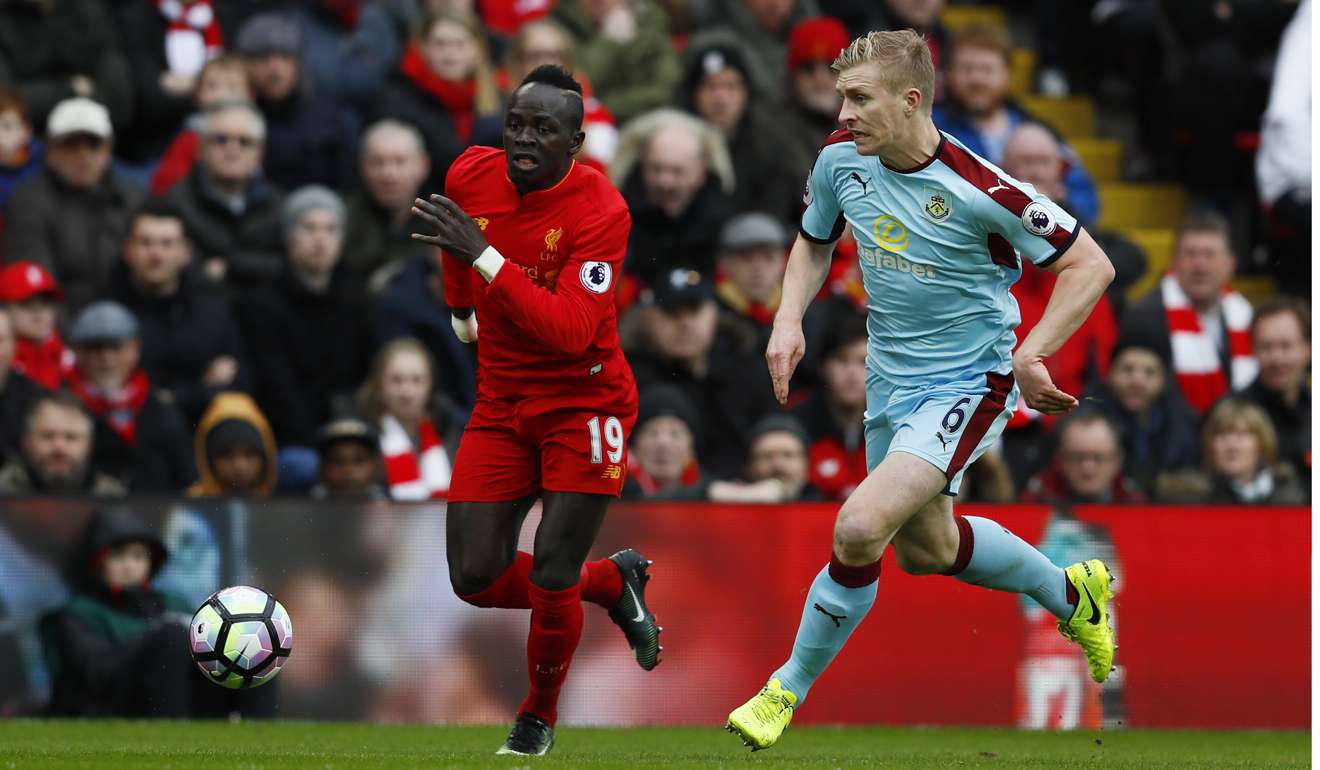 Liverpool's Sadio Mane (left) in action with Burnley's Ben Mee. Photo: Reuters