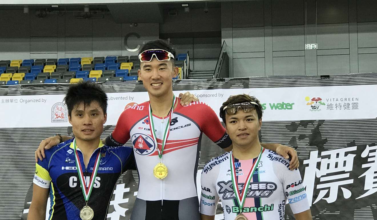 Hong Kong Olympian Leung Chun-wing stands on the medal podium after winning the men's omnium. He joined by Ko Siu-wai (left) and Leung Ka-yu.