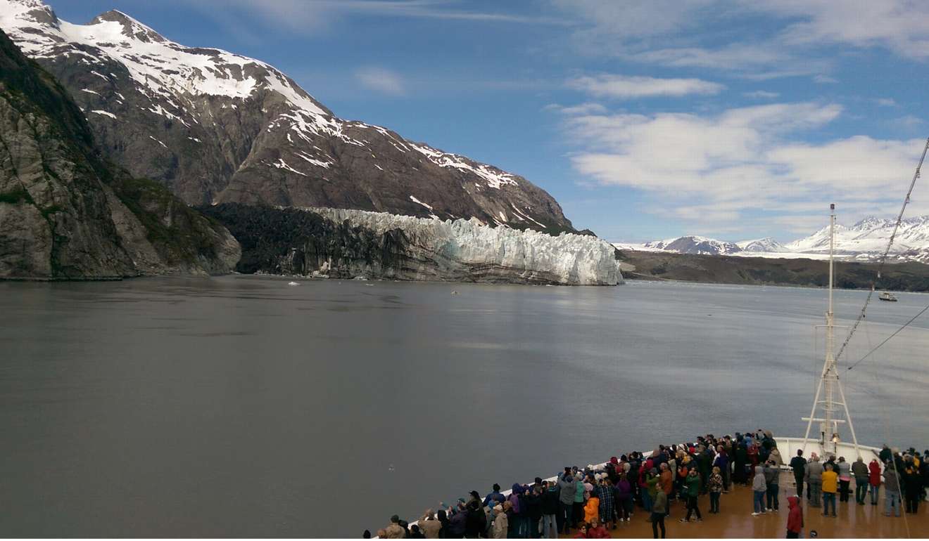 Tourists admire Margerie Glacier from aboard the Zaandam in Glacier Bay.