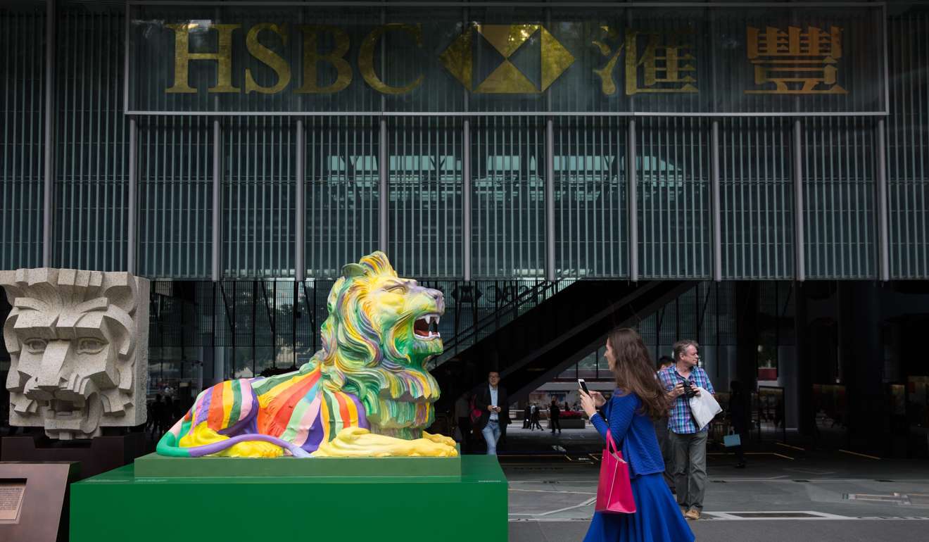 One of the two replicas of the iconic HSBC lions, painted in rainbow colours, that the bank displayed outside its headquarters in Hong Kong, to mark its “Celebrate Pride, Celebrate Unity” campaign in November. HSBC is not a signatory to the Equal Opportunities Commission and Gender Research Centre joint statement. Photo: EPA