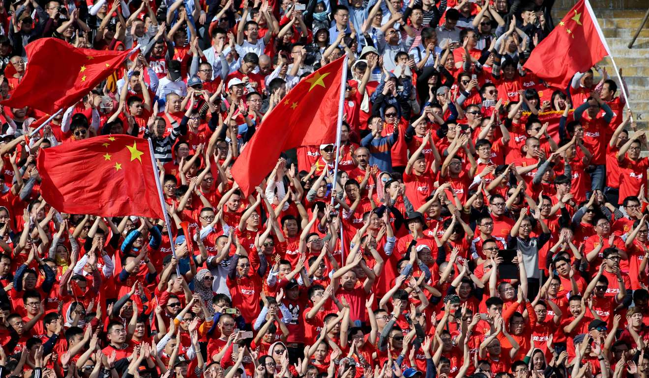 China's fans came out in force against Iran. Photo: AFP