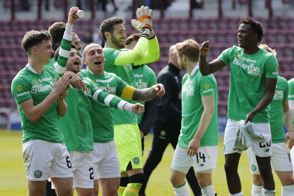 Celtic’s Scott Brown and teammates celebrate winning the Scottish Premiership. Photo: Reuters