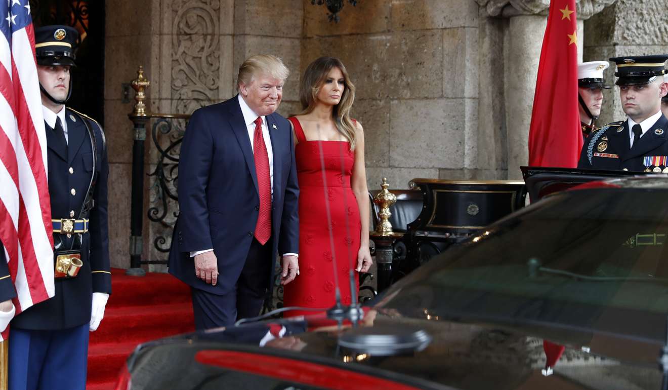 President Donald Trump and first lady Melania Trump smile as Chinese President Xi Jinping and Chinese first lady Peng Liyuan arrive at Mar-a-Lago. Photo: AP
