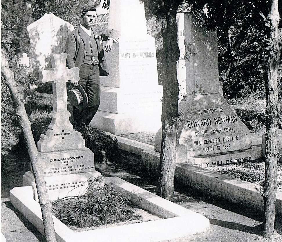 Frank Newman, by his parents’ graves, in Chefoo, in 1900. Picture: courtesy of Duncan Clark
