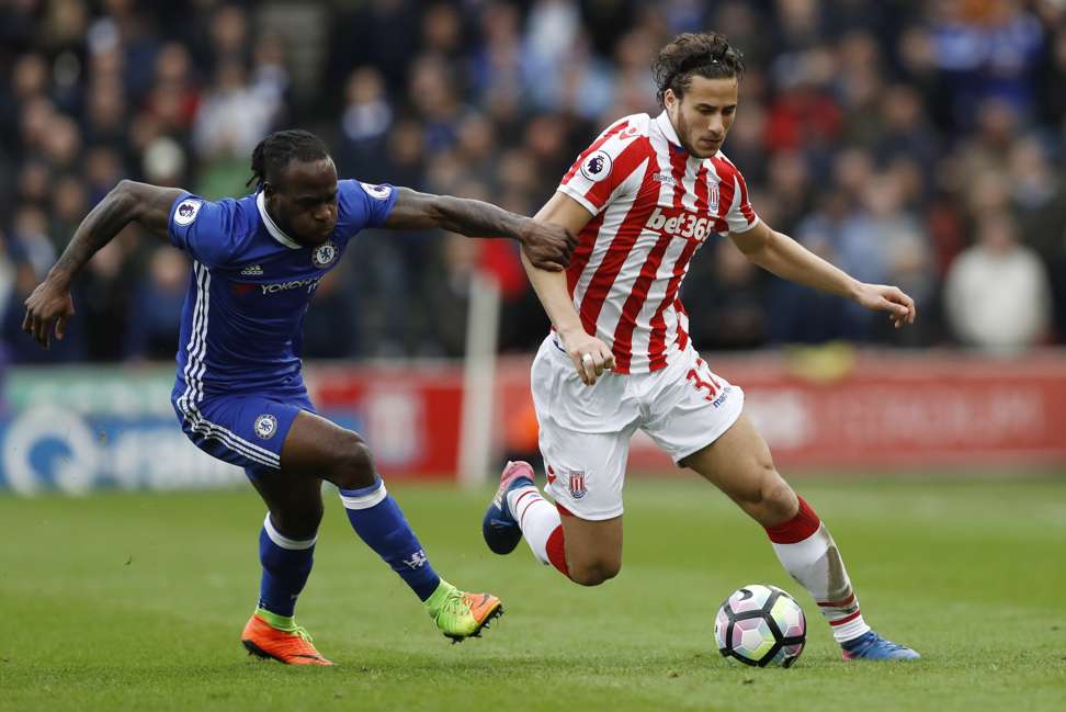 Stoke City's Ramadan Sobhi (right) in action with Chelsea's Victor Moses. Photo: Reuters