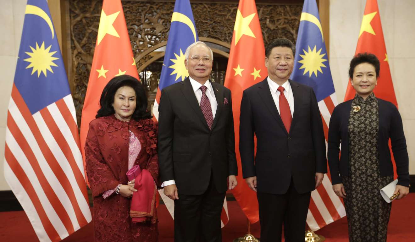 Malaysia's Prime Minister Najib Razak and his wife Rosmah Mansor meet Chinese President Xi Jinping and his wife Peng Liyuan at the Diaoyutai State Guesthouse in Beijing on November 3, 2016. Photo: AFP
