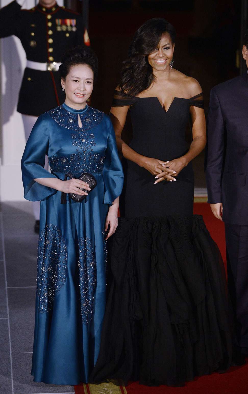 Former first lady Michelle Obama and Madame Peng Liyuan attend a State Dinner reception at the White House in Washington on September 25, 2015. Photo: Abaca Press