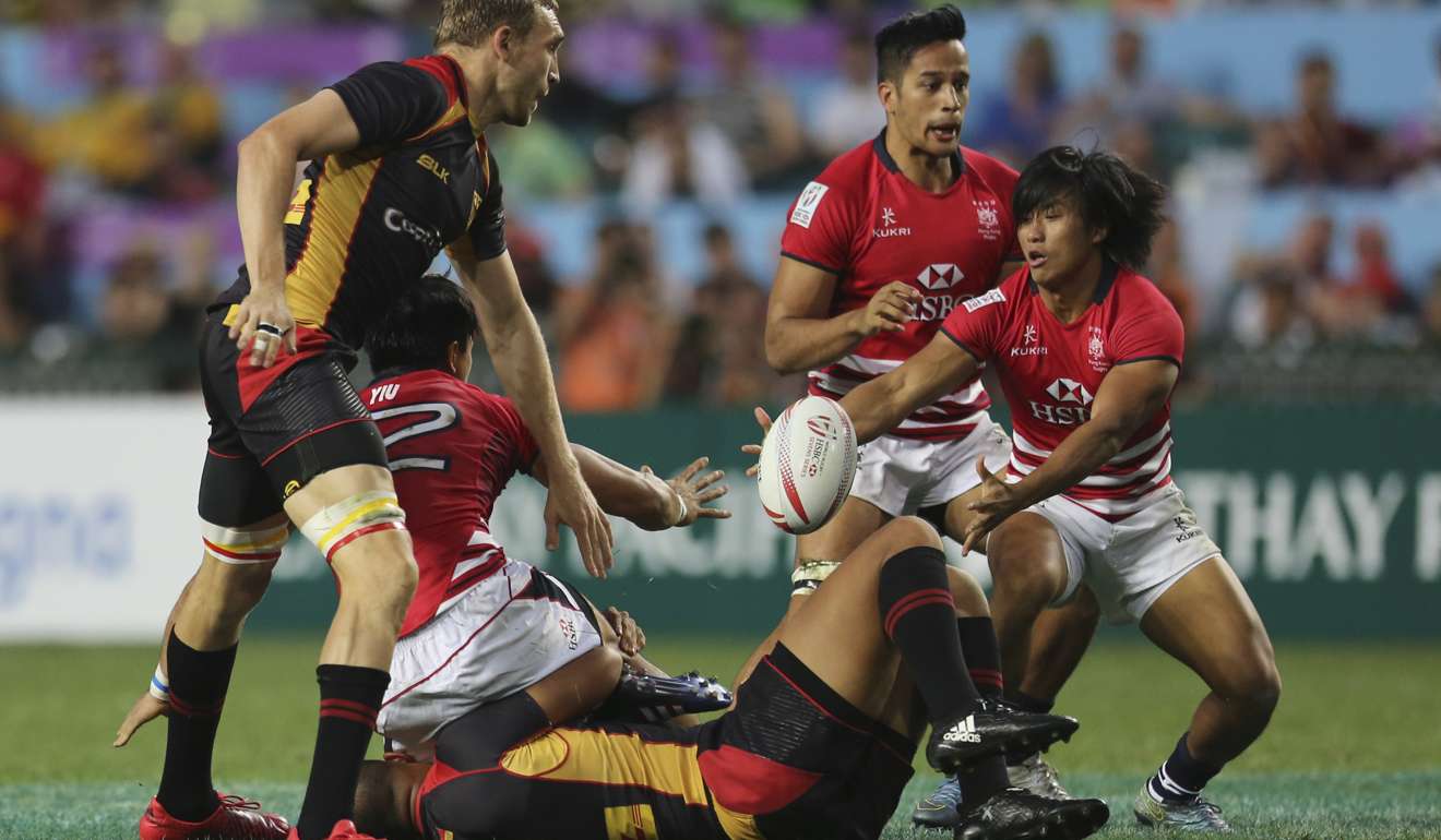 Hong Kong's Cado Lee Ka-to tries to mount an attack against Germany. Photo: Xiaomei Chen