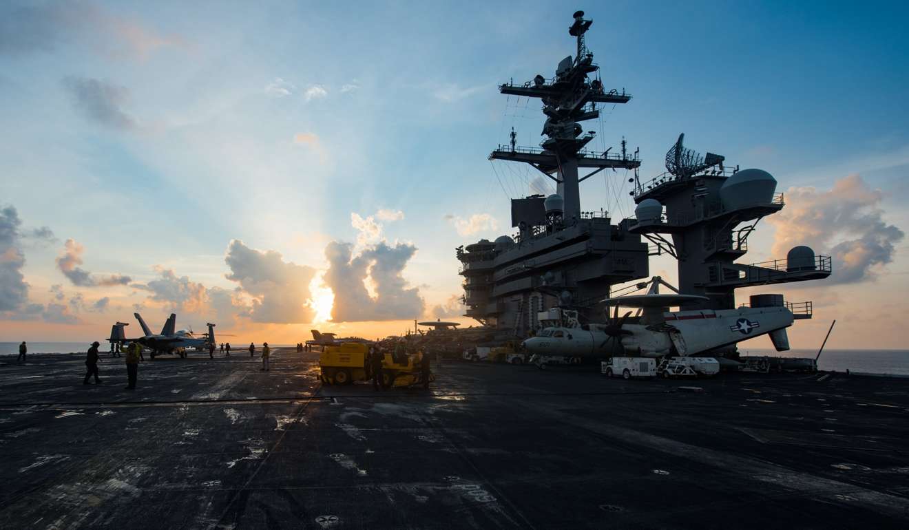 A handout photo from the US Navy shows the aircraft carrier USS Carl Vinson as it transits the South China Sea last week. The Carl Vinson US Navy Strike Group is moving towards the Korean peninsula to provide a “show of force” against North Korea in the wake of its ballistic missile tests. Photo: EPA
