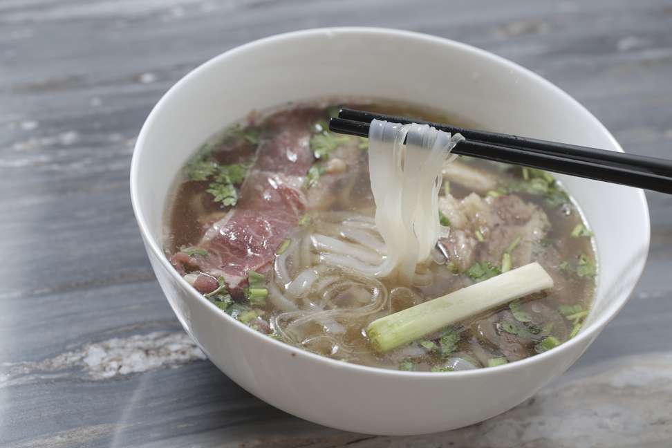 Beef noodles with raw and cooked beef. Photo: Paul Yeung