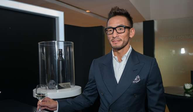 Hidetoshi Nakata and his limited-edition sake “N” 2015.
