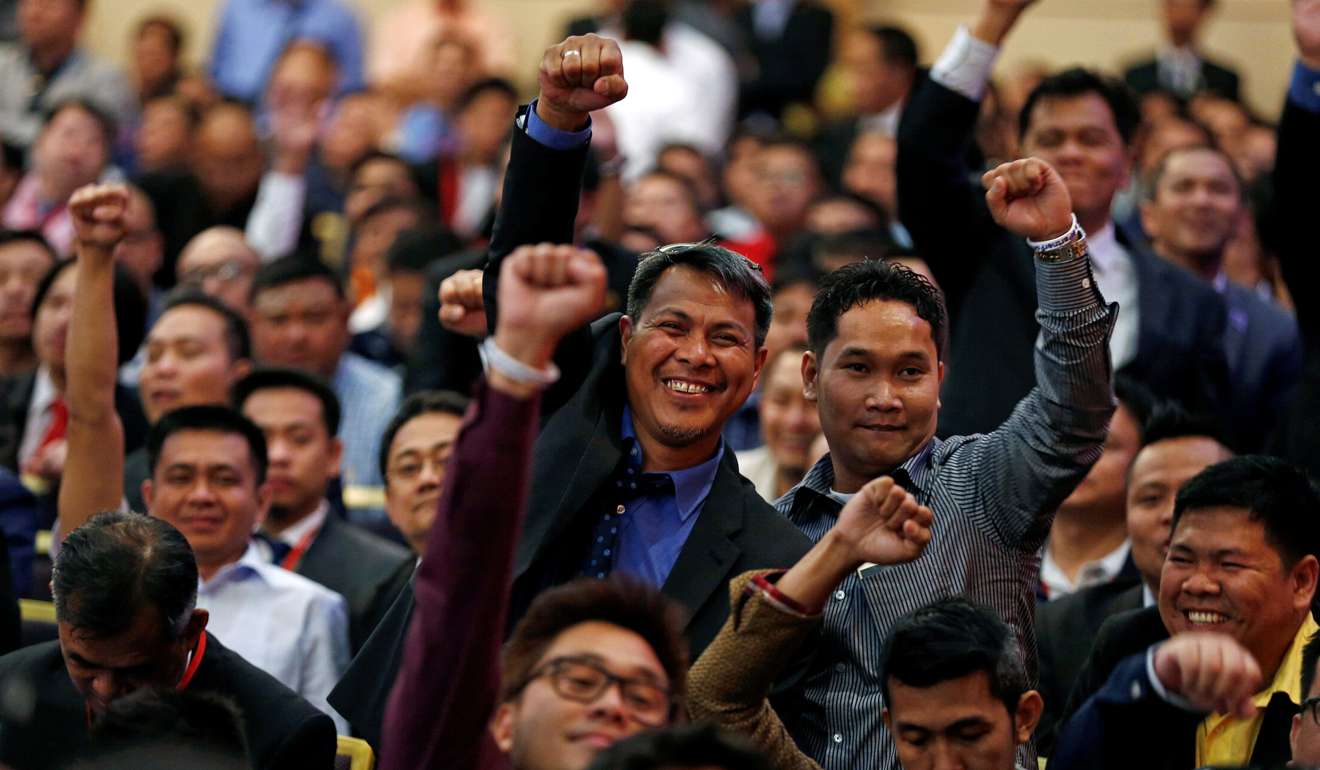 Members of the Filipino community attend a meeting with Philippine President Rodrigo Duterte in Riyadh. Photo: Reuters