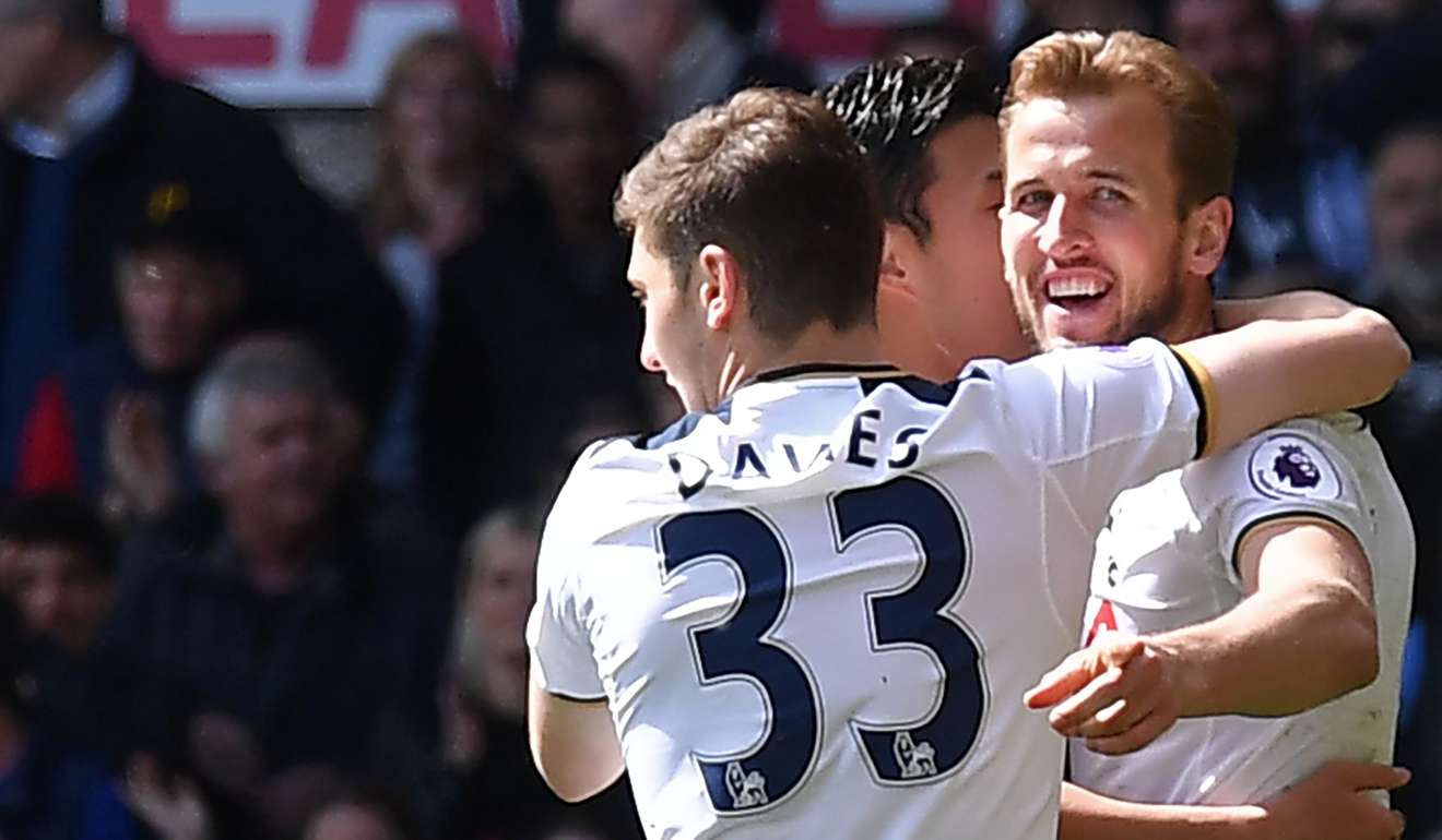 Spurs’ Harry Kane (right) celebrates with teammates after scoring. Photo: AFP