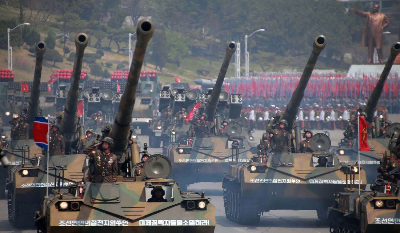 Korean People's howitzers are displayed through Kim Il-sung square during a military parade in Pyongyang. Photo: AFP