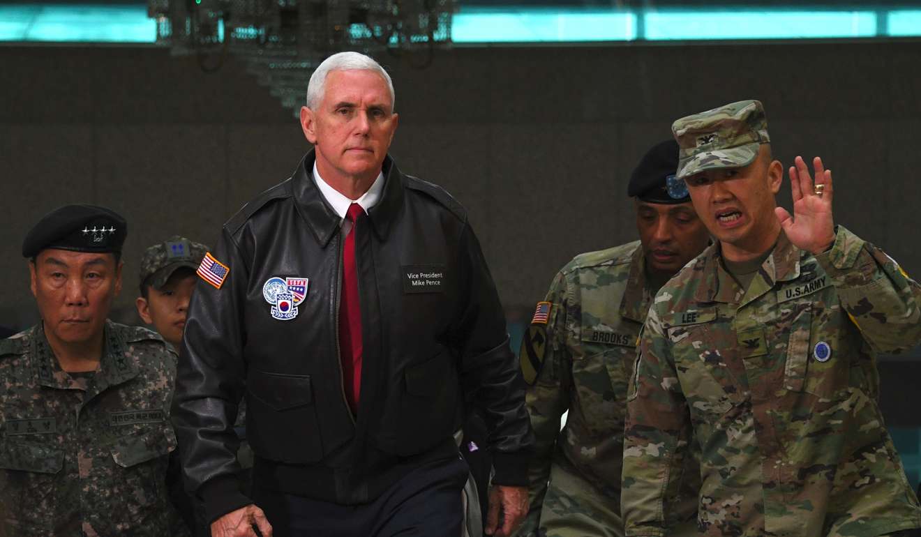 US Vice-President Mike Pence (C) visits the truce village of Panmunjom in the Demilitarized Zone (DMZ) on the border between North and South Korea. Photo: AFP