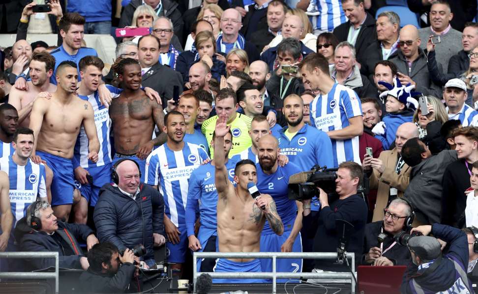 Brighton and Hove Albion’s Anthony Knockaert leads the celebrations. Photo: AP