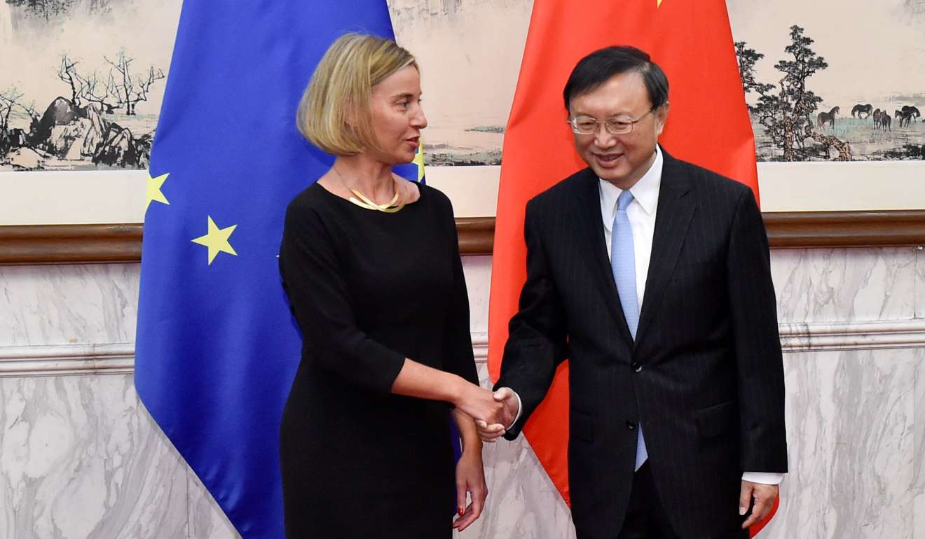EU foreign policy chief Federica Mogherini (left) shakes hands with China’s State Councillor Yang Jiechi before the talks in Beijing on Wednesday. Photo: Reuters