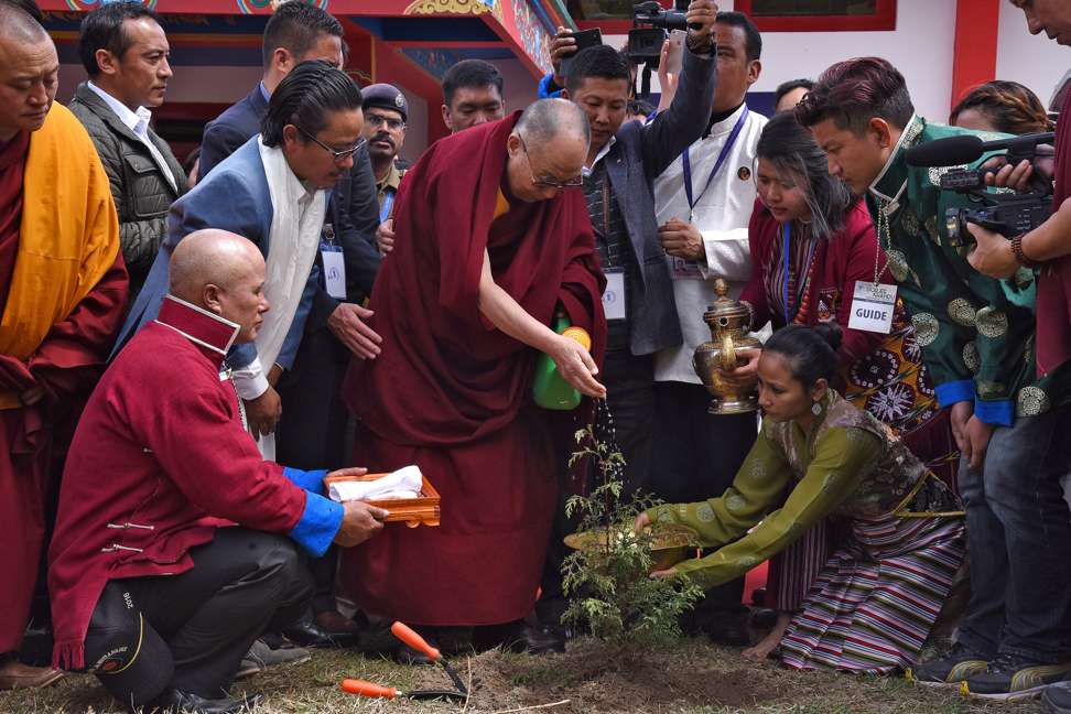 The Dalai Lama waters a plant during his visit to Jangchub Chorten in Tawang, in the northeastern state of Arunachal Pradesh. His visit this month angered China. Photo: Reuters