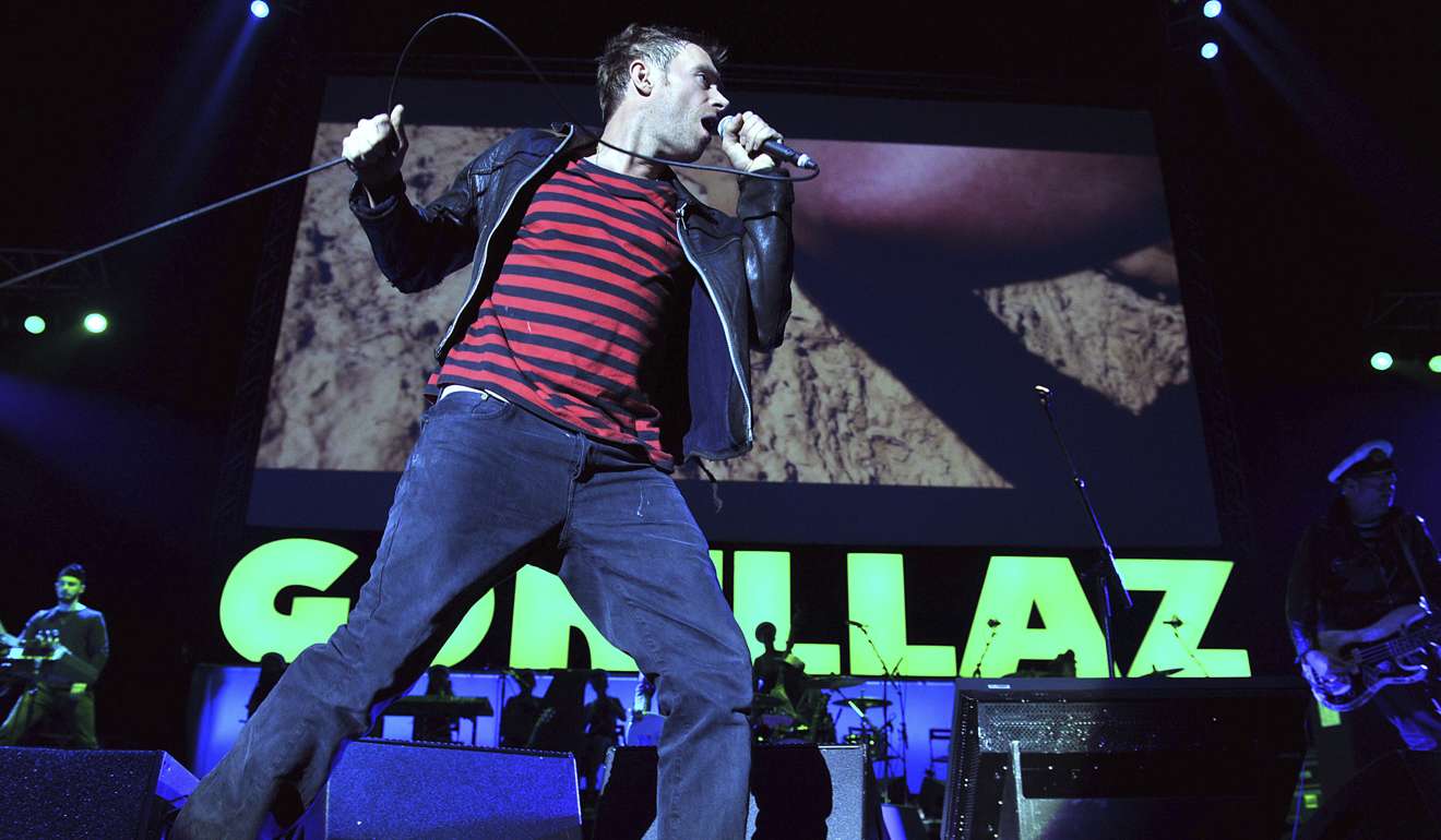 The British band Gorillaz performs at London's O2 Arena. The band is one of many musicians using new technology, including 360-degree cameras, virtual reality musical experiences and vertical videos, to reach the smart phone generation of music fans who are discovering new music on their phones and tablets. Photo: AP