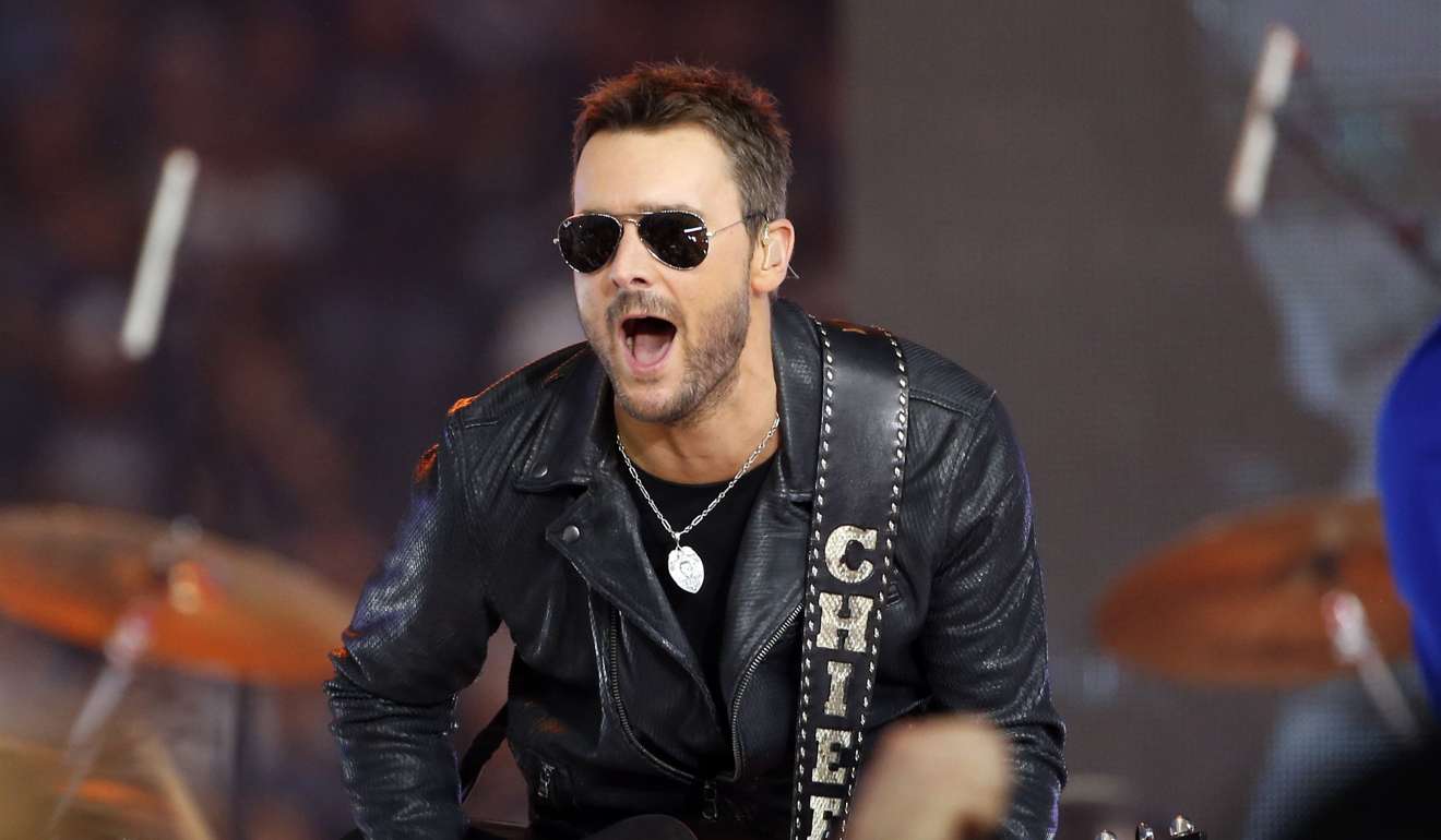 Country music singer Eric Church performs at halftime during an NFL football game between the Washington Redskins and Dallas Cowboys in Arlington, Texas. Church is one of many musicians using new technology to reach fans in the smartphone generation. Photo: AP