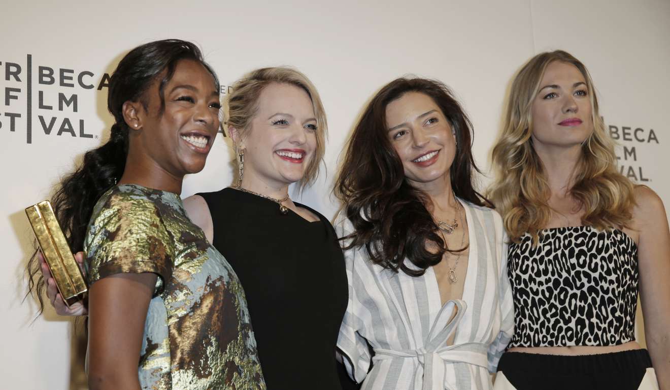Actresses Samira Wiley (far left) and Elisabeth Moss, director and producer Reed Morano (second from right), and actress Yvonne Strahovski (right) attend Hulu's world premiere of The Handmaid's Tale at the 2017 Tribeca Film Festival in New York. Photo: EPA