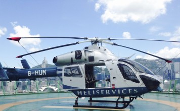The helicopter used for Viator’s tour of Hong Kong, parked on the roof of The Peninsula hotel, in Tsim Sha Tsui. Pictures: Rachael Barker