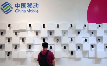 China Mobile said it had 837.038 million total mobile subscribers at the end of June. Photo: Imaginechina