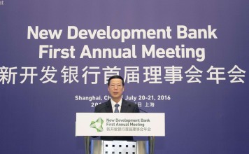 Chinese Vice Premier Zhang Gaoli addresses the opening of the first annual meeting of New Development Bank in Shanghai on Wednesday. Photo: Xinhua