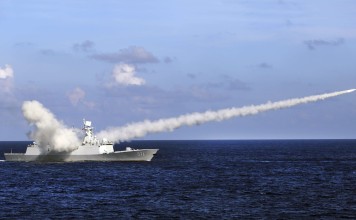 Chinese missile frigate Yuncheng launches an anti-ship missile during a military exercise in the waters near south China's Hainan Island and Paracel Islands. They are controlled by Beijing but also claimed by Vietnam and Taiwan. Photo: Xinhua
