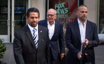Rupert Murdoch (centre) and son Lachlan Murdoch (left) leave the News Corporation building on Thursday in New Yorkafter Fox News CEO Roger Ailes departed the company. Photo: AFP