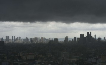 Dark storm clouds over the Manila skyline. Before Singapore, before Hong Kong, Manila was the undisputed centre of commerce in Asia Pacific. Photo: AFP