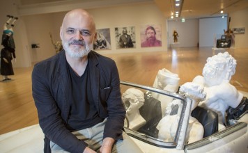 Konstantin Bessmertny with his artwork "Ride ", on show at the Ad Lib exhibition in Macau. Photos: May Tse