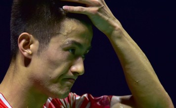 Chen Long of China reacts during the men's singles final against Jan O Jorgensen of Denmark at the China Open badminton tournament in Fuzhou, capital of southeast China's Fujian Province, Nov. 20. Chen Long lost 0-2. (Xinhua/Wei Peiquan)