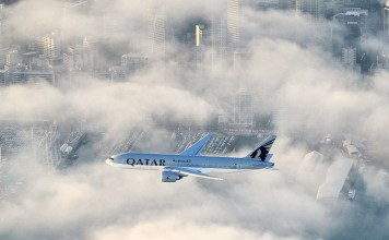 Qatar Airways’ first flight to New Zealand flies over the city of Auckland on its final approach to the airport. Photo: Qatar Airways