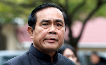 Thailand's Prime Minister Prayuth Chan-ocha arrives at a weekly cabinet meeting at the Government House in Bangkok, Thailand, January 17, 2017. REUTERS/Chaiwat Subprasom