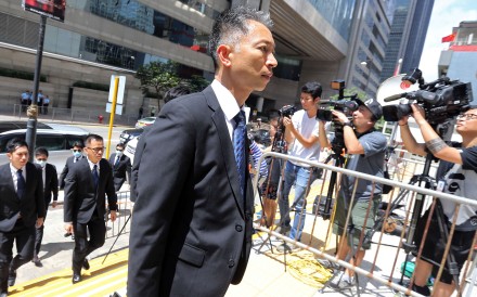 Police officers arriving at the District Court in Wan Chai on Thursday. Photo: Dickson Lee