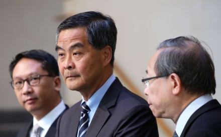 From left, Hong Kong Secretary for Justice Rimsky Yuen Kwok-keung; Chief Executive Leung Chun-ying; and Secretary for Security Lai Tung-kwok announce the delegation to Beijing at the Central Government Office in Tamar. Photo: Sam Tsang