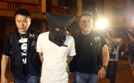 Police arrested a man for illegal bookmaking and seized a total of HK$350 million worth of betting slips in Ping Shek Estate. Photo: SCMP Pictures