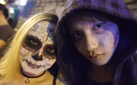 It’s only Halloween: Hong Kong’s partygoers celebrate in Lan Kwai Fong. Photo: EPA